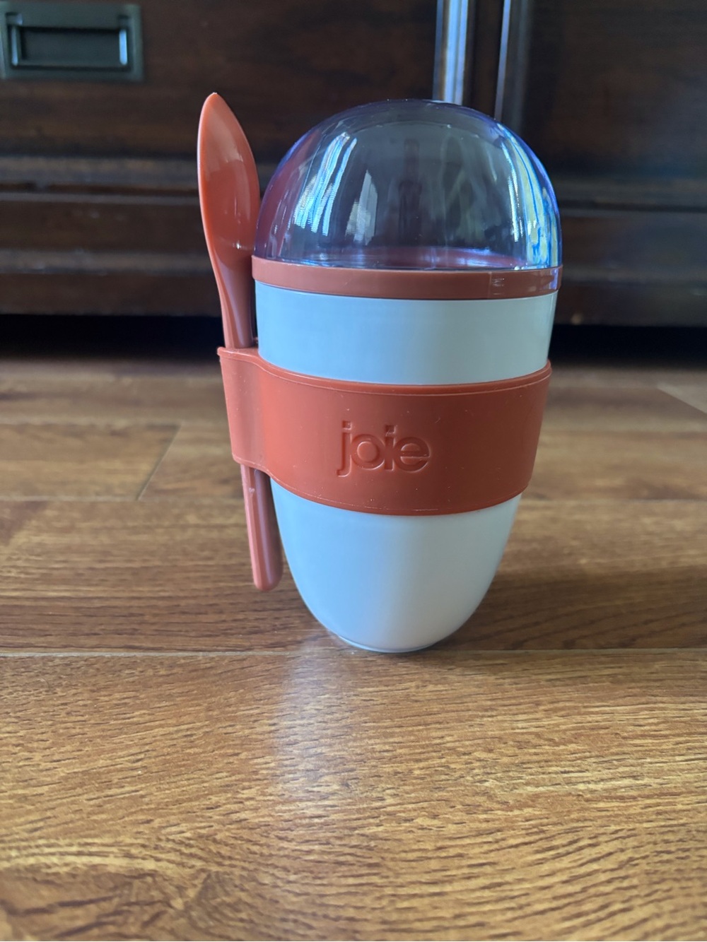 Joie White yogurt travel container with Coral Silicone Band and Spoon